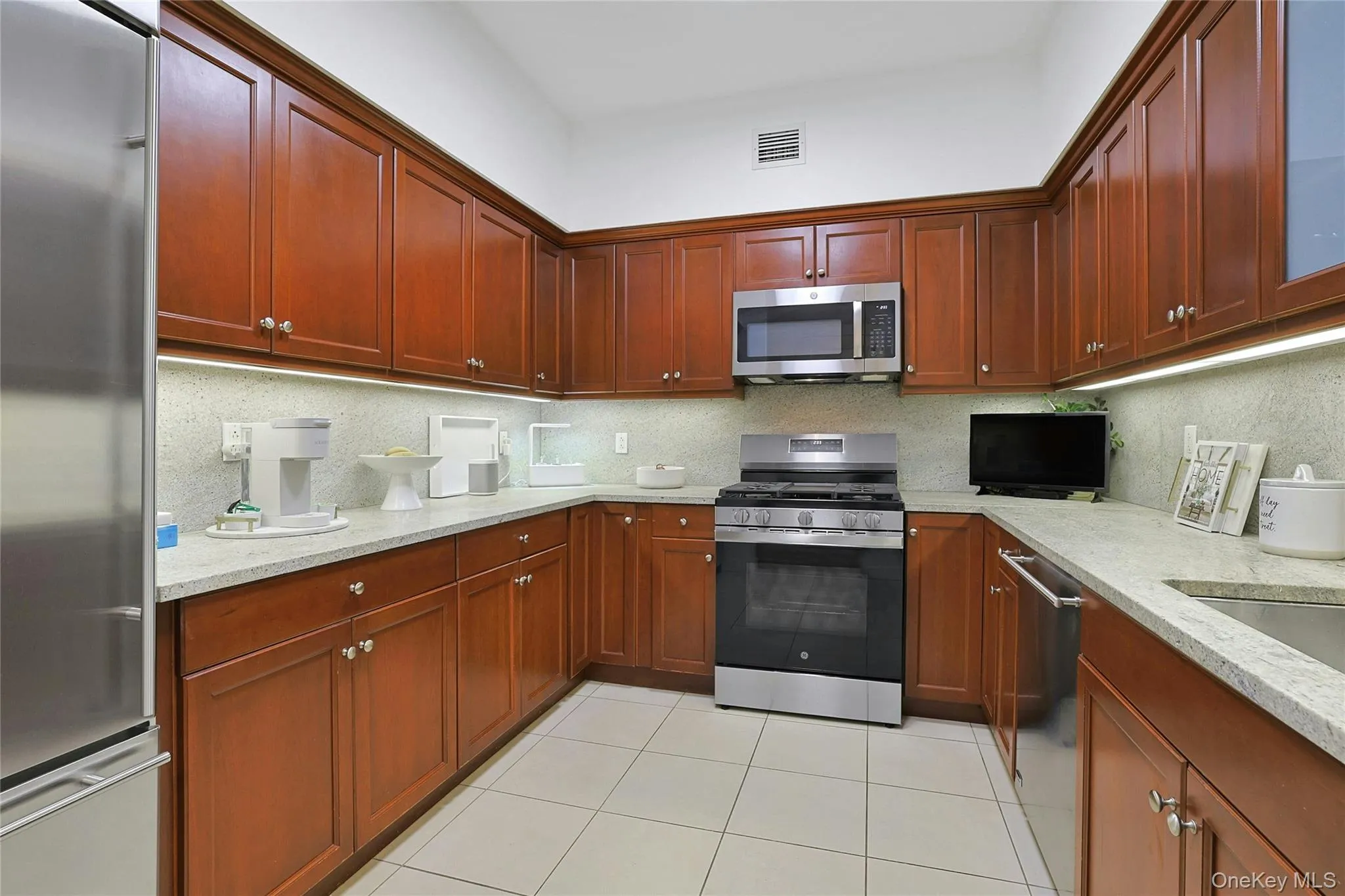 Another View of the Abundant Cabinetry and Counter Space. Stainless Steel Appliances. Another View of the Abundant Cabinetry and Counter Space. Stainless Steel Appliances.