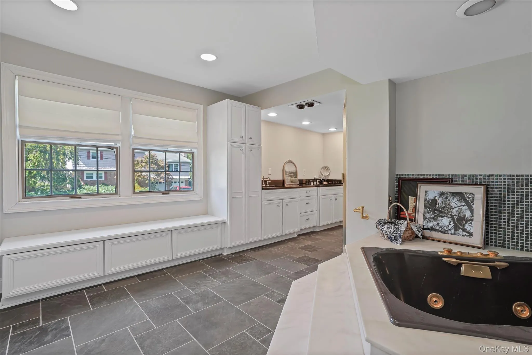 Natural light in spacious primary bathroom Natural light in spacious primary bathroom