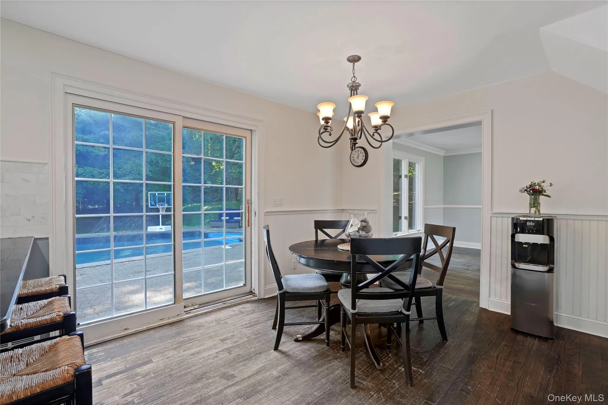 Eat in area of open kitchen, slider to yard & pool Eat in area of open kitchen, slider to yard & pool