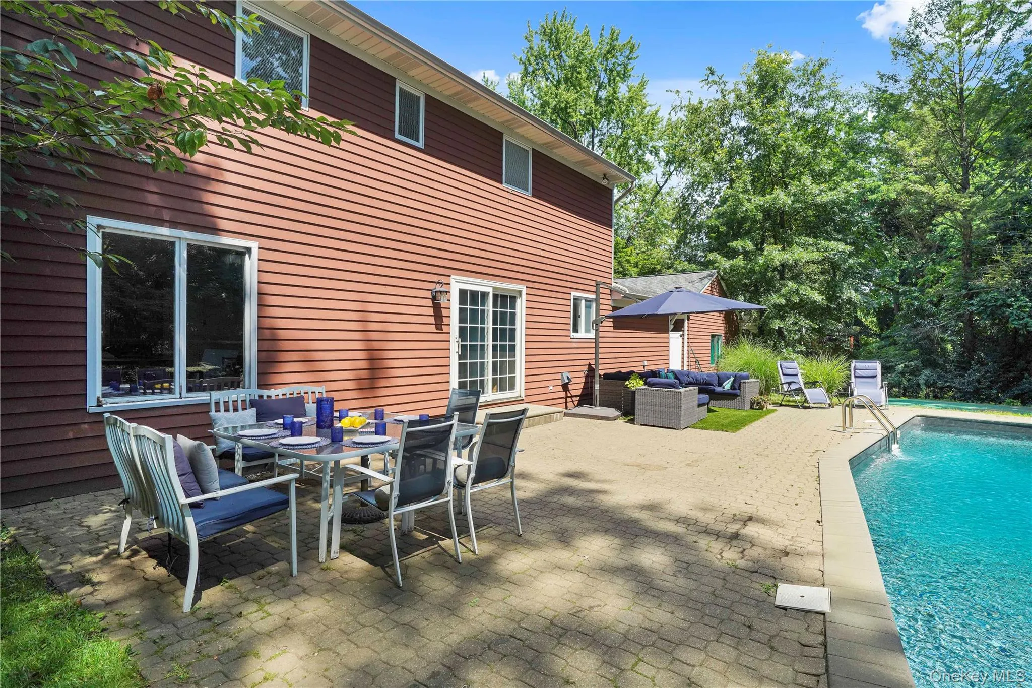 Expansive patio for entertaining poolside. Expansive patio for entertaining poolside.