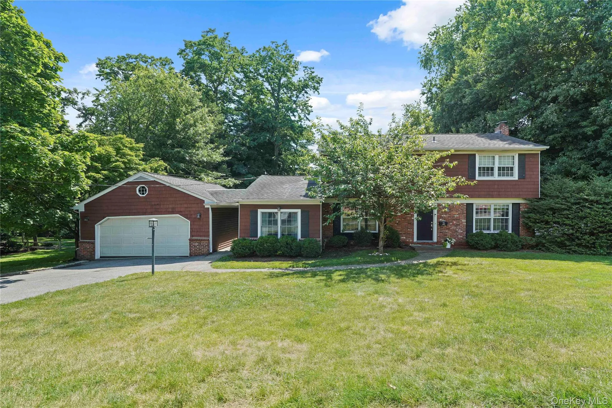 Expansive grassy front yard to enjoy as well. Expansive grassy front yard to enjoy as well.