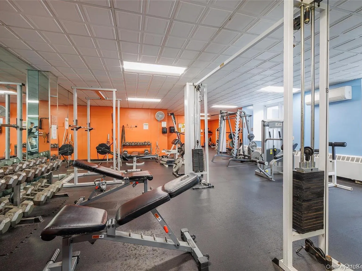 Fitness center featuring various weight training and cardio equipment and personal training room Fitness center featuring various weight training and cardio equipment and personal training room