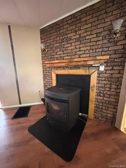 Pellet stove with custom mantle Pellet stove with custom mantle