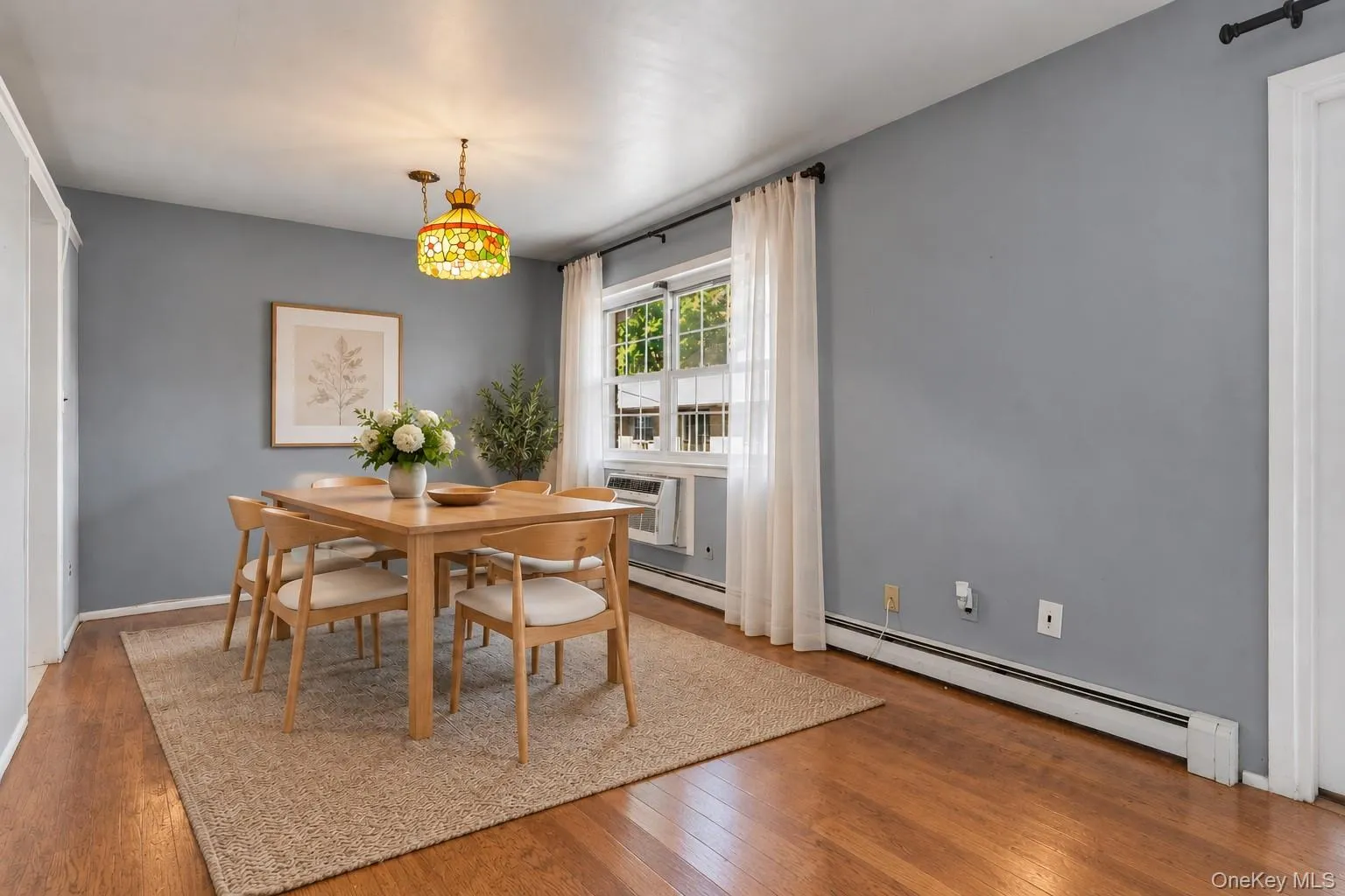 Virtually Edited Dining Area: Dining Area, Hardwood Floors Under Carpet Virtually Edited Dining Area: Dining Area, Hardwood Floors Under Carpet