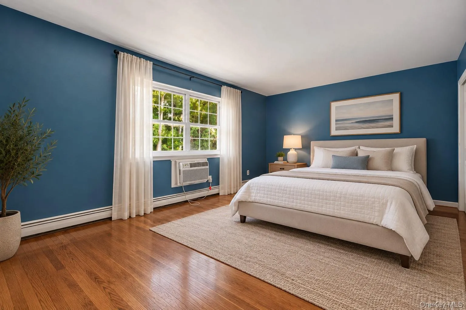 Virtually Edited and Staged Bedroom: Hardwood Floors Under Carpet. Virtually Edited and Staged Bedroom: Hardwood Floors Under Carpet.