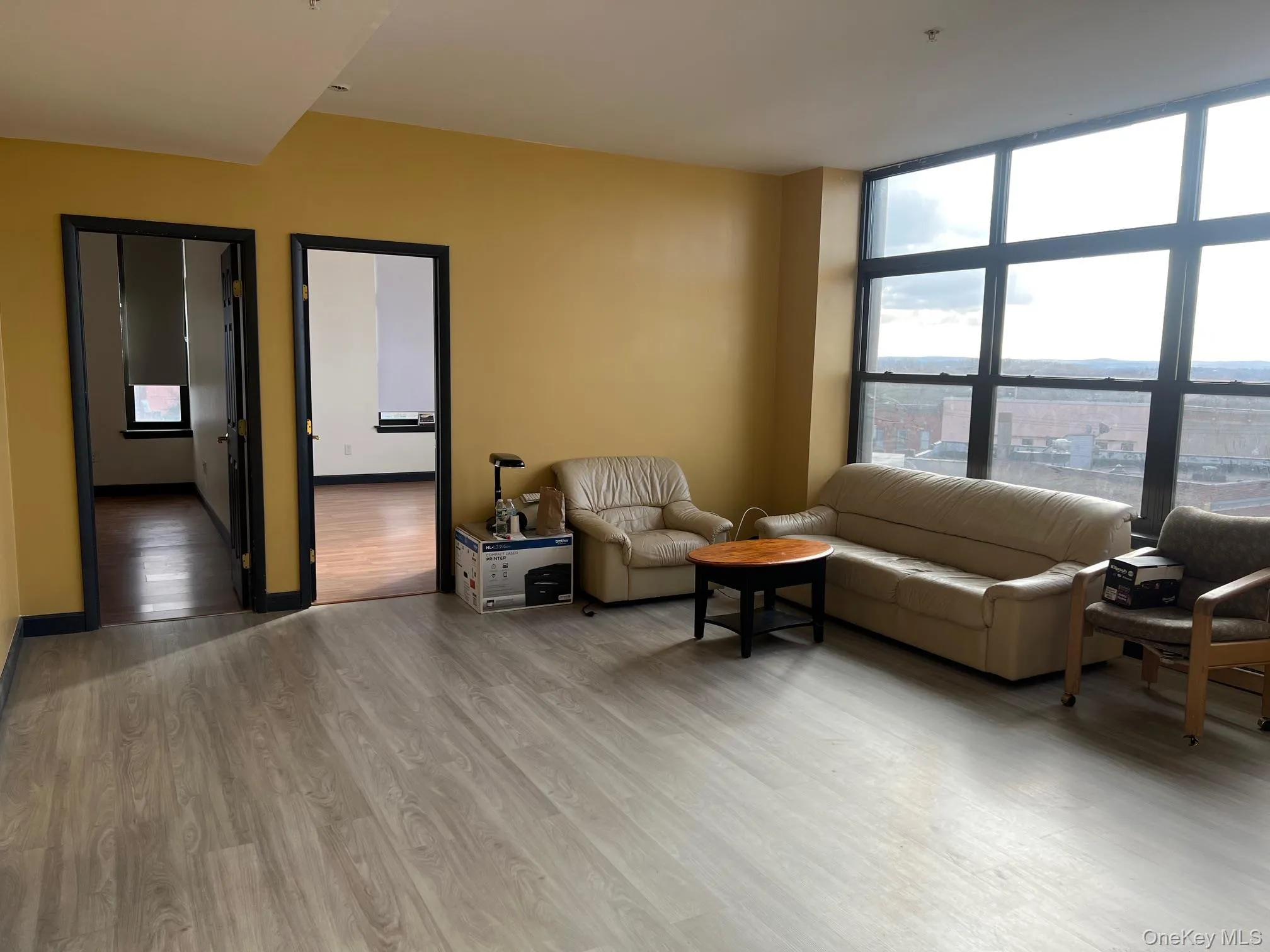 Living room with hardwood / wood-style flooring Living room with hardwood / wood-style flooring