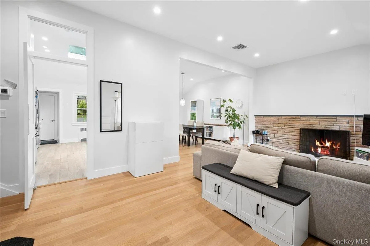 Open concept living area with hard wood flooring Open concept living area with hard wood flooring