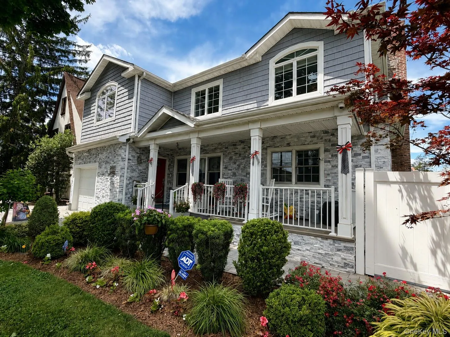 Beautifully landscaped front yard with stunning curb appeal. Beautifully landscaped front yard with stunning curb appeal.
