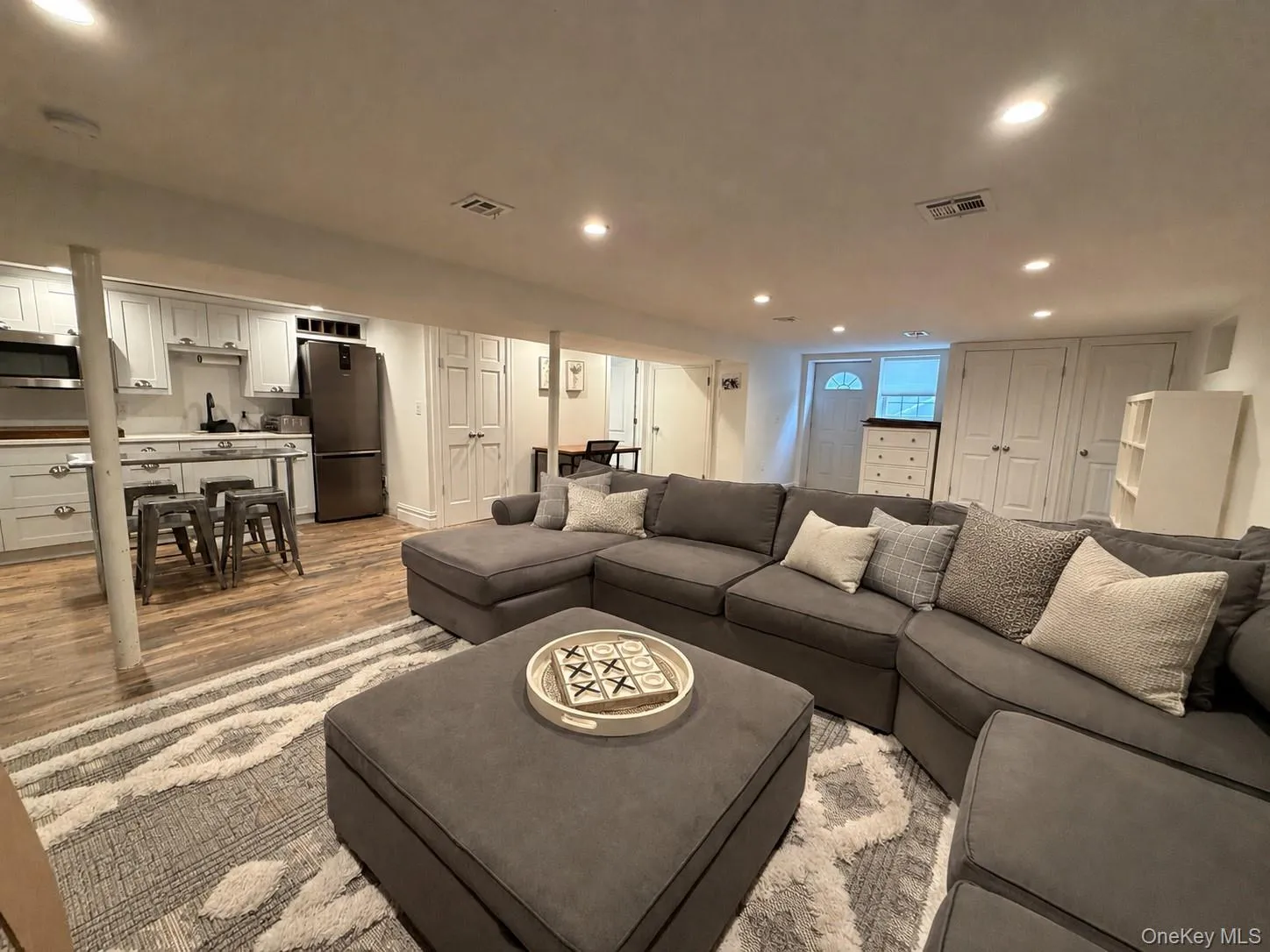Spacious basement with 2nd washer/dryer, two separate entrances, full bath and kitchenette. Spacious basement with 2nd washer/dryer, two separate entrances, full bath and kitchenette.
