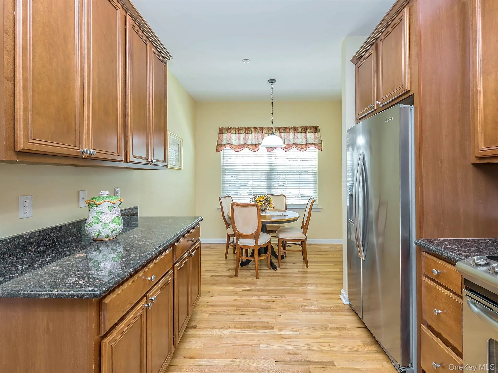 Open kitchen and breakfast nook. Open kitchen and breakfast nook.