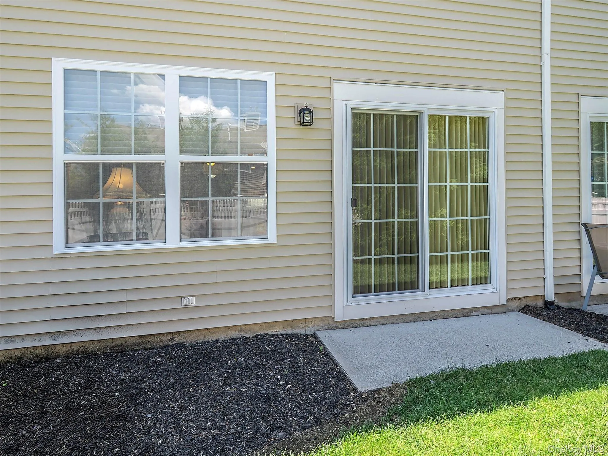 Sliding Doors to patio and open grass area. Sliding Doors to patio and open grass area.