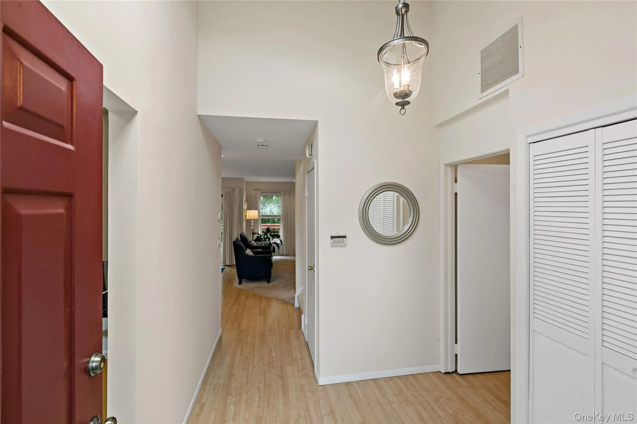 Foyer - High Cathedral Ceiling. Coat Closet. Laundry Closet. Foyer - High Cathedral Ceiling. Coat Closet. Laundry Closet.