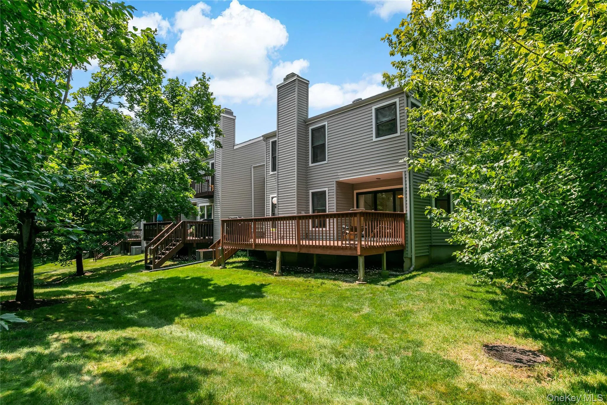 Expansive Deck has Views and steps to grassy area Expansive Deck has Views and steps to grassy area