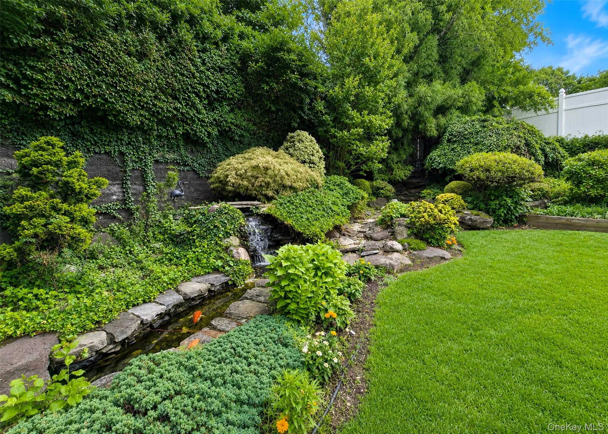 Koi Pond with Waterfalls Koi Pond with Waterfalls