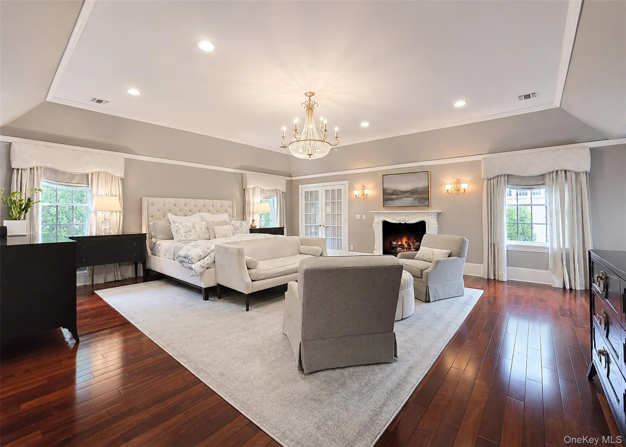 Masterfully Designed Primary En Suite with his/hers walk-in closets, fireplace and office Masterfully Designed Primary En Suite with his/hers walk-in closets, fireplace and office