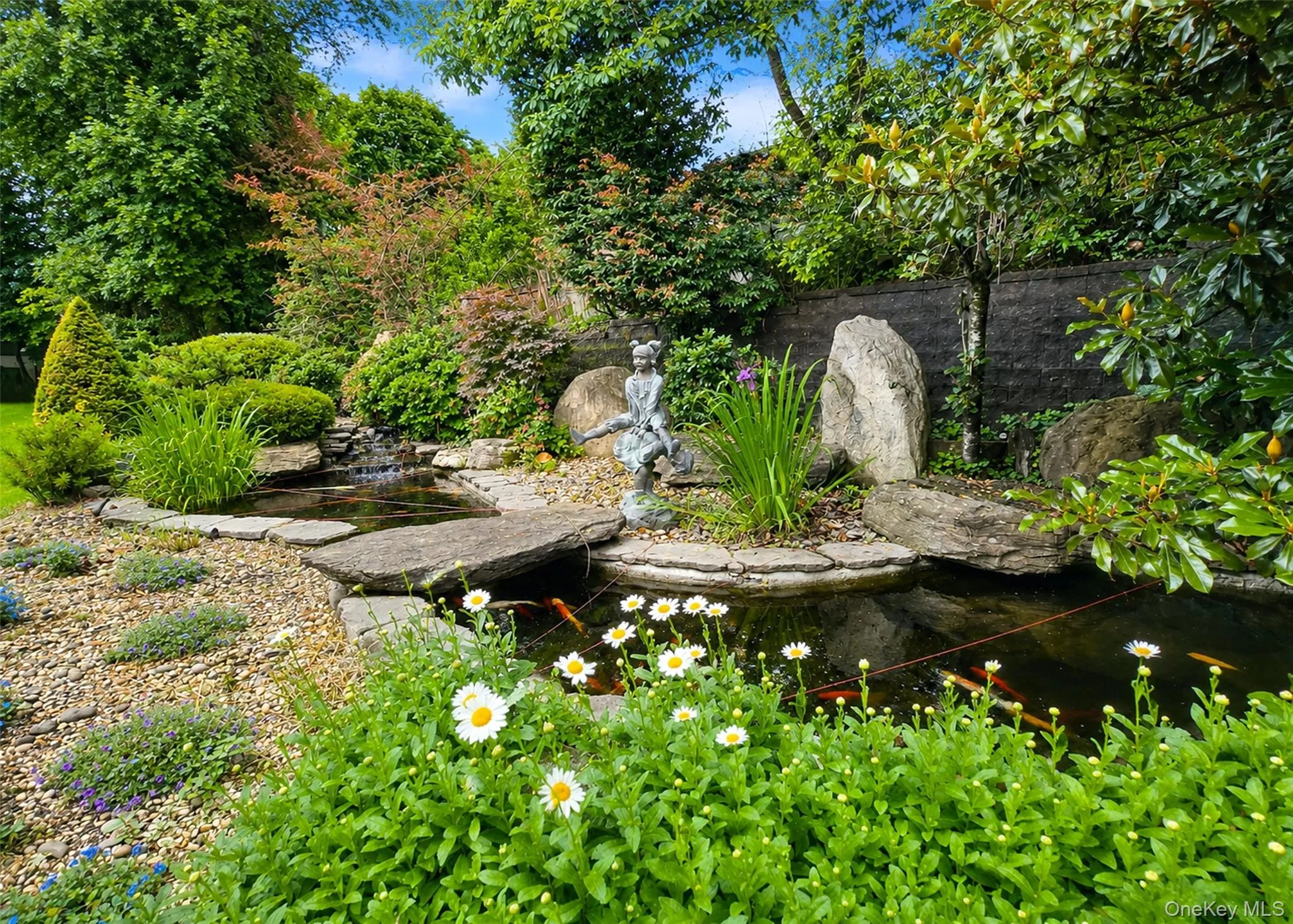 Tranquil and Serene Pond with Waterfall Tranquil and Serene Pond with Waterfall