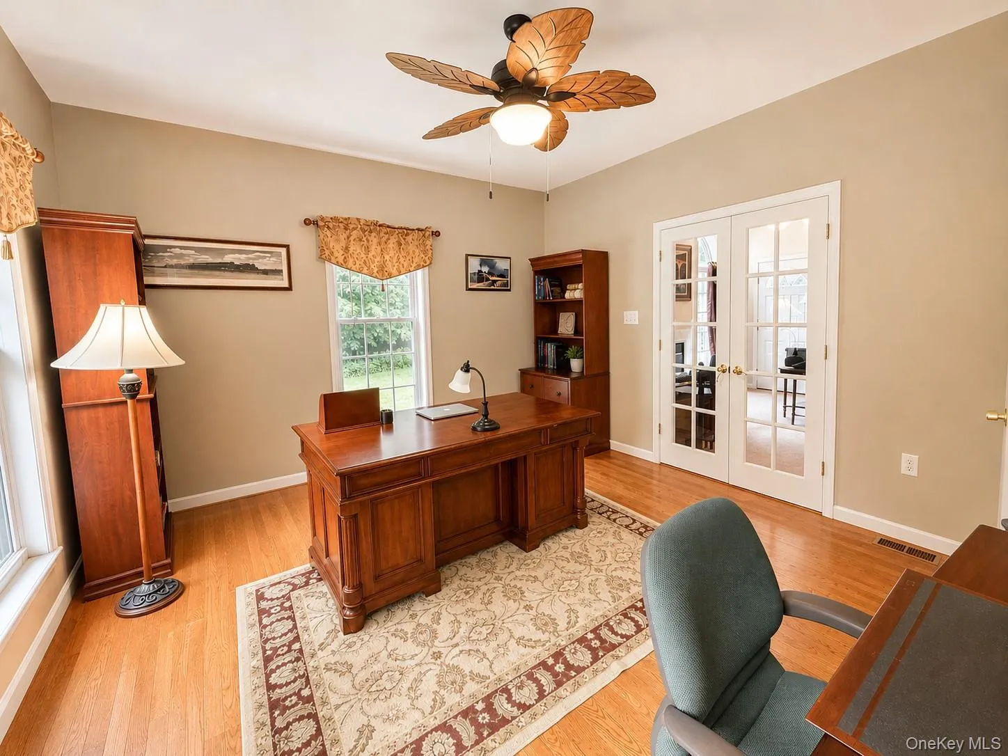 Large office with French doors leading to living room Large office with French doors leading to living room
