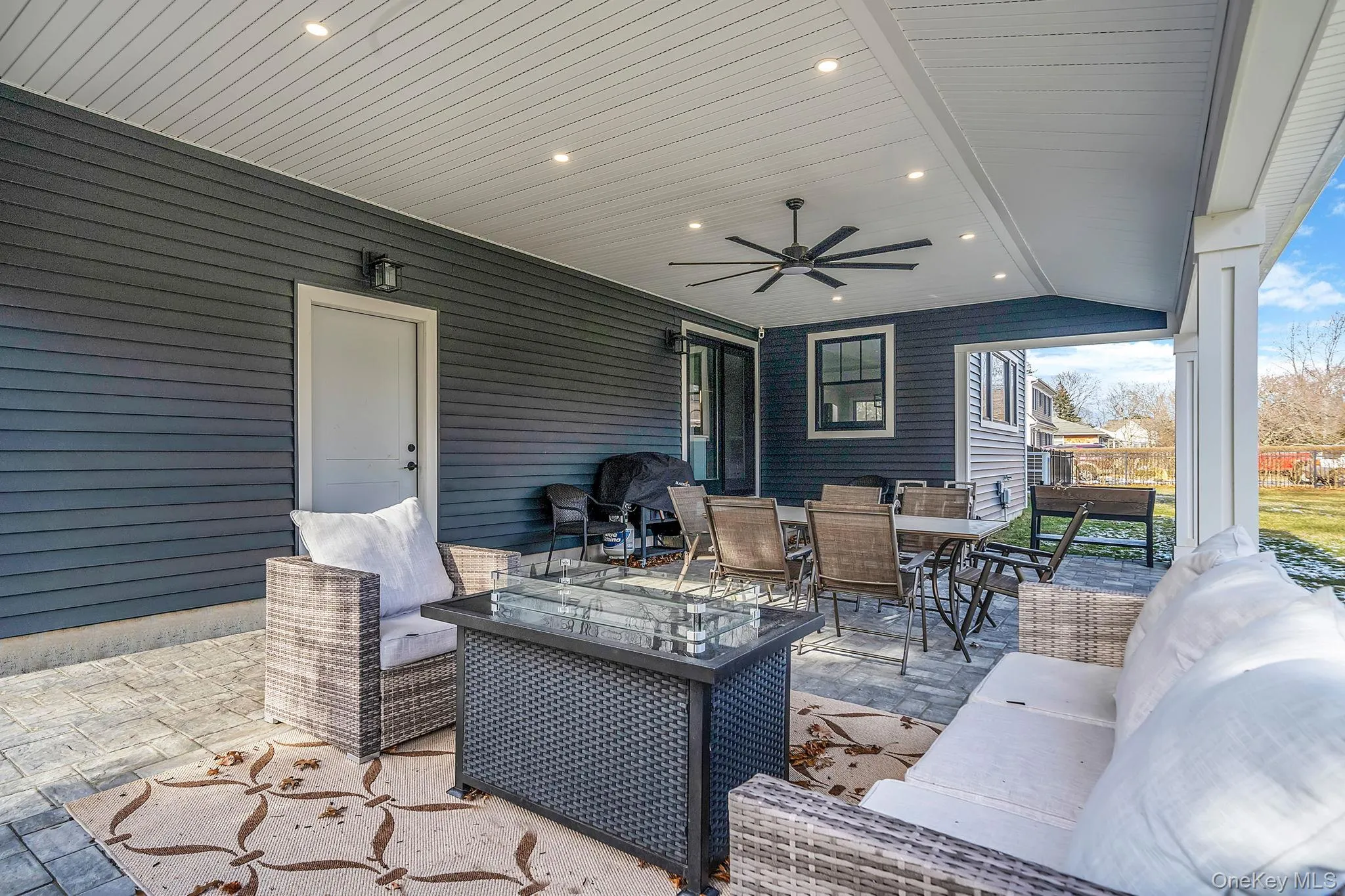 Sliders from Kitchen Lead to Covered Porch with Fan Sliders from Kitchen Lead to Covered Porch with Fan