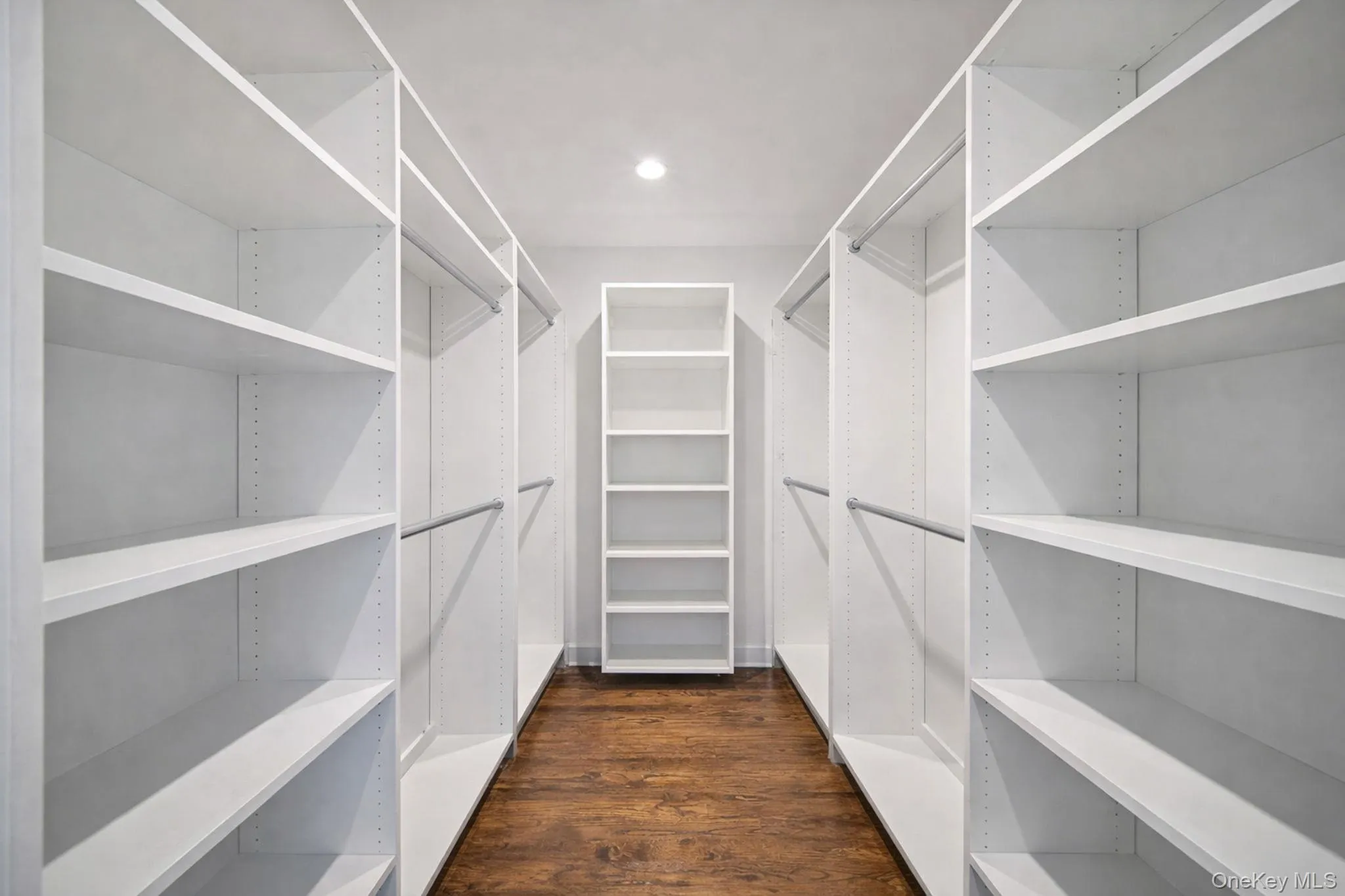 Primary Bedroom Closet (Shown Empty) Primary Bedroom Closet (Shown Empty)