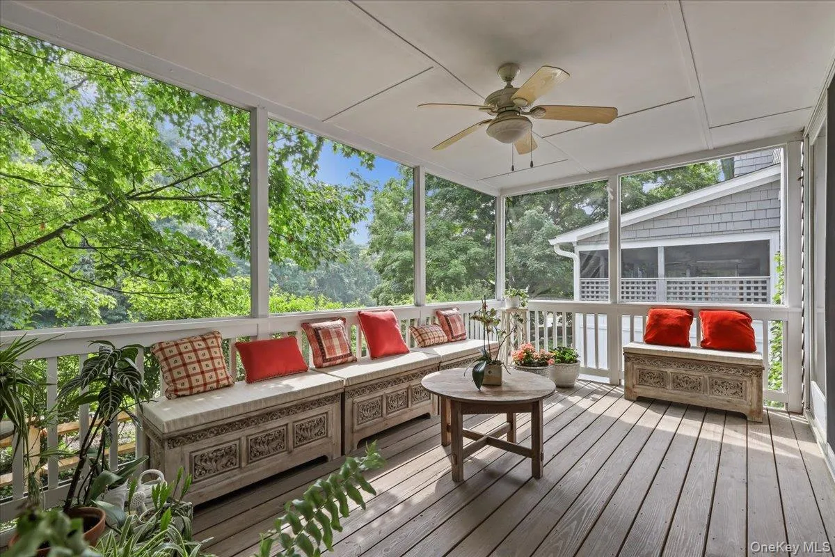 Another view of screened porch overlooking 3rd hole green Another view of screened porch overlooking 3rd hole green