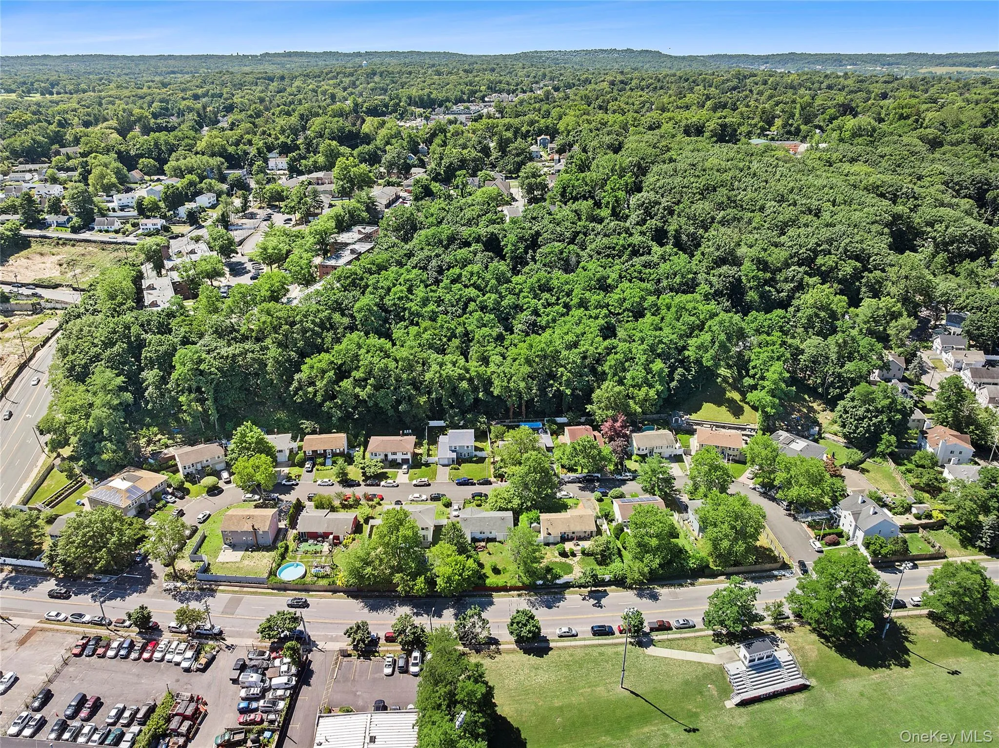 Aerial perspective showcasing a residential area with varied housing styles Aerial perspective showcasing a residential area with varied housing styles