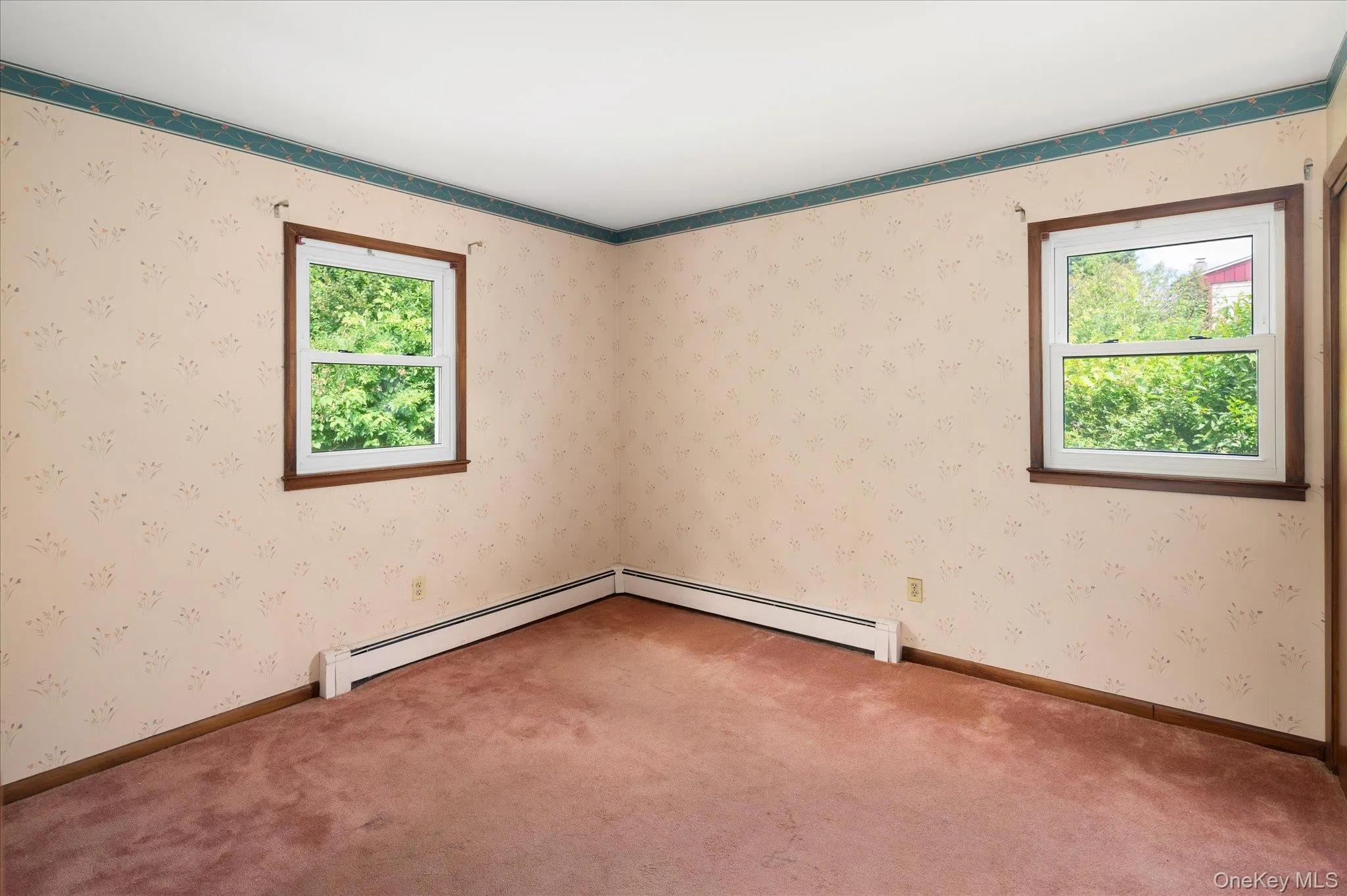 Back Bedroom (yes there are wood floors under that carpet) Back Bedroom (yes there are wood floors under that carpet)