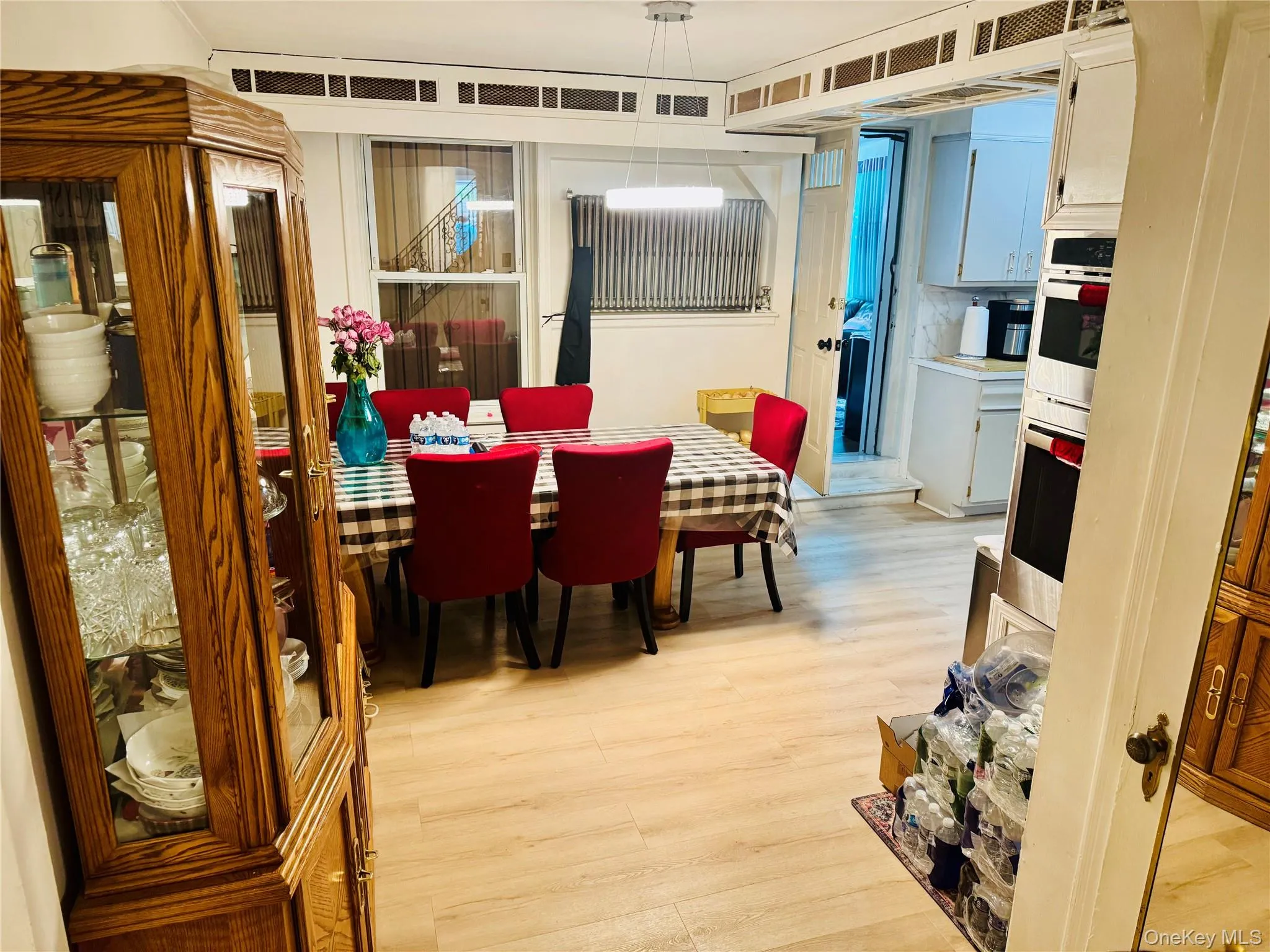 Dining space featuring light wood-style floors Dining space featuring light wood-style floors