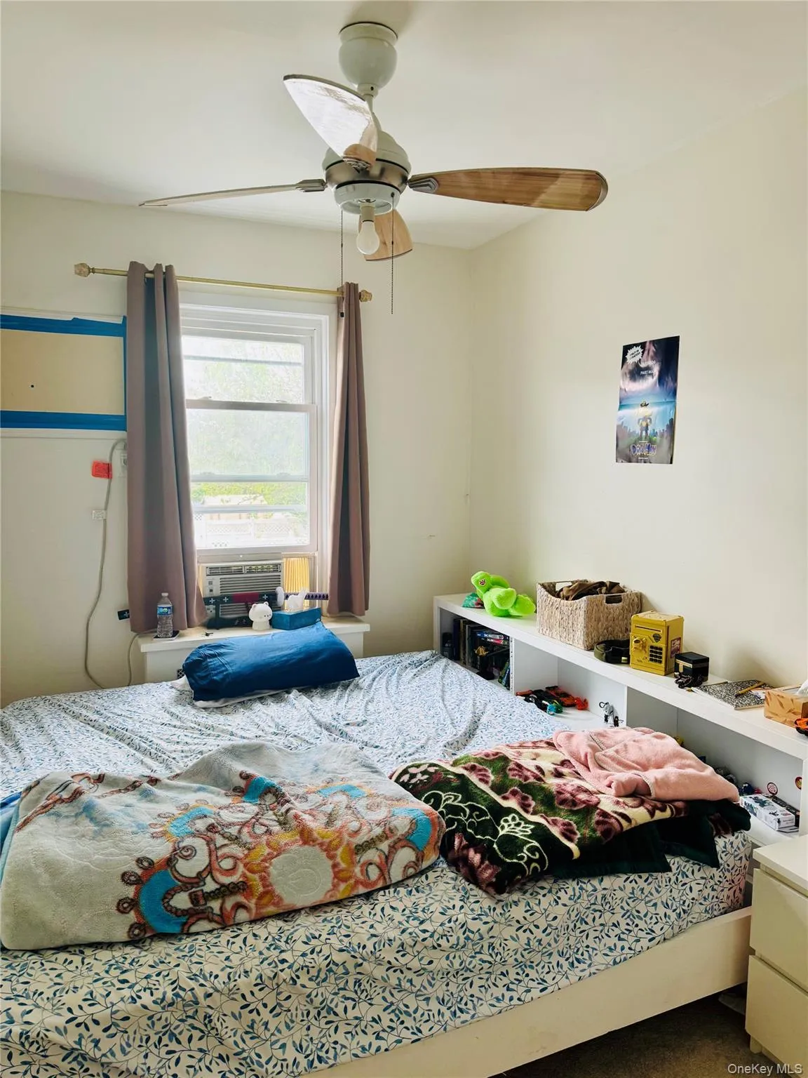 Bedroom featuring ceiling fan Bedroom featuring ceiling fan