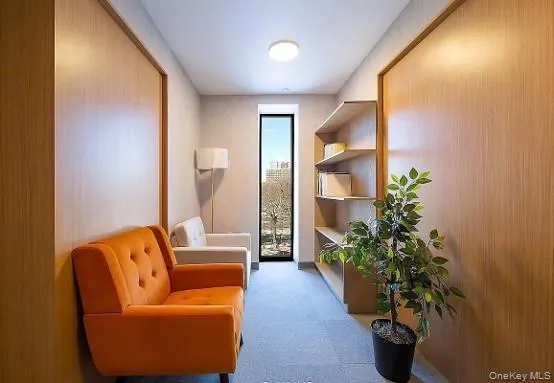 Modern interior featuring wood-panel accent walls and recessed shelving Modern interior featuring wood-panel accent walls and recessed shelving