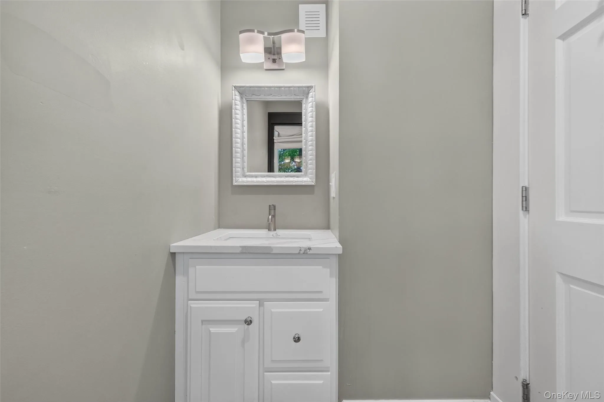 First floor half bath. First floor half bath.