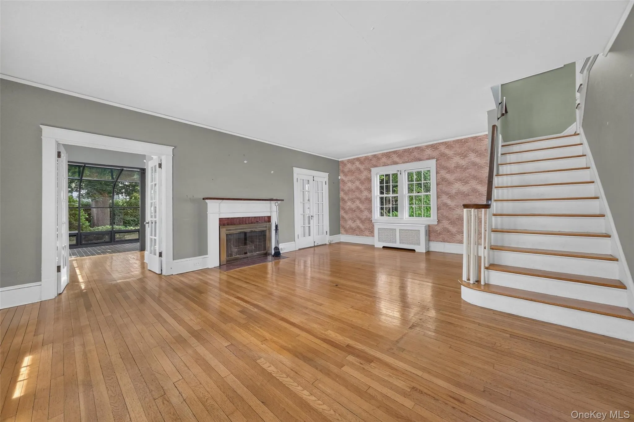Living room with wood burning fireplace. Living room with wood burning fireplace.