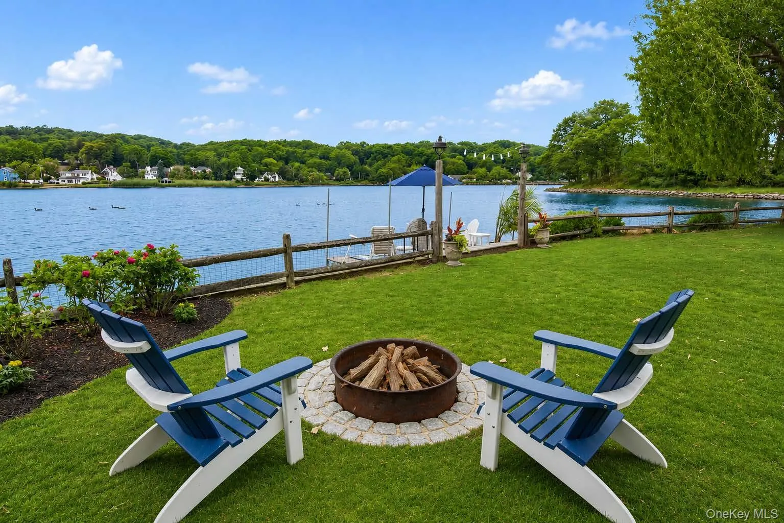 Cozy up by the fire pit while taking in the views. Cozy up by the fire pit while taking in the views.