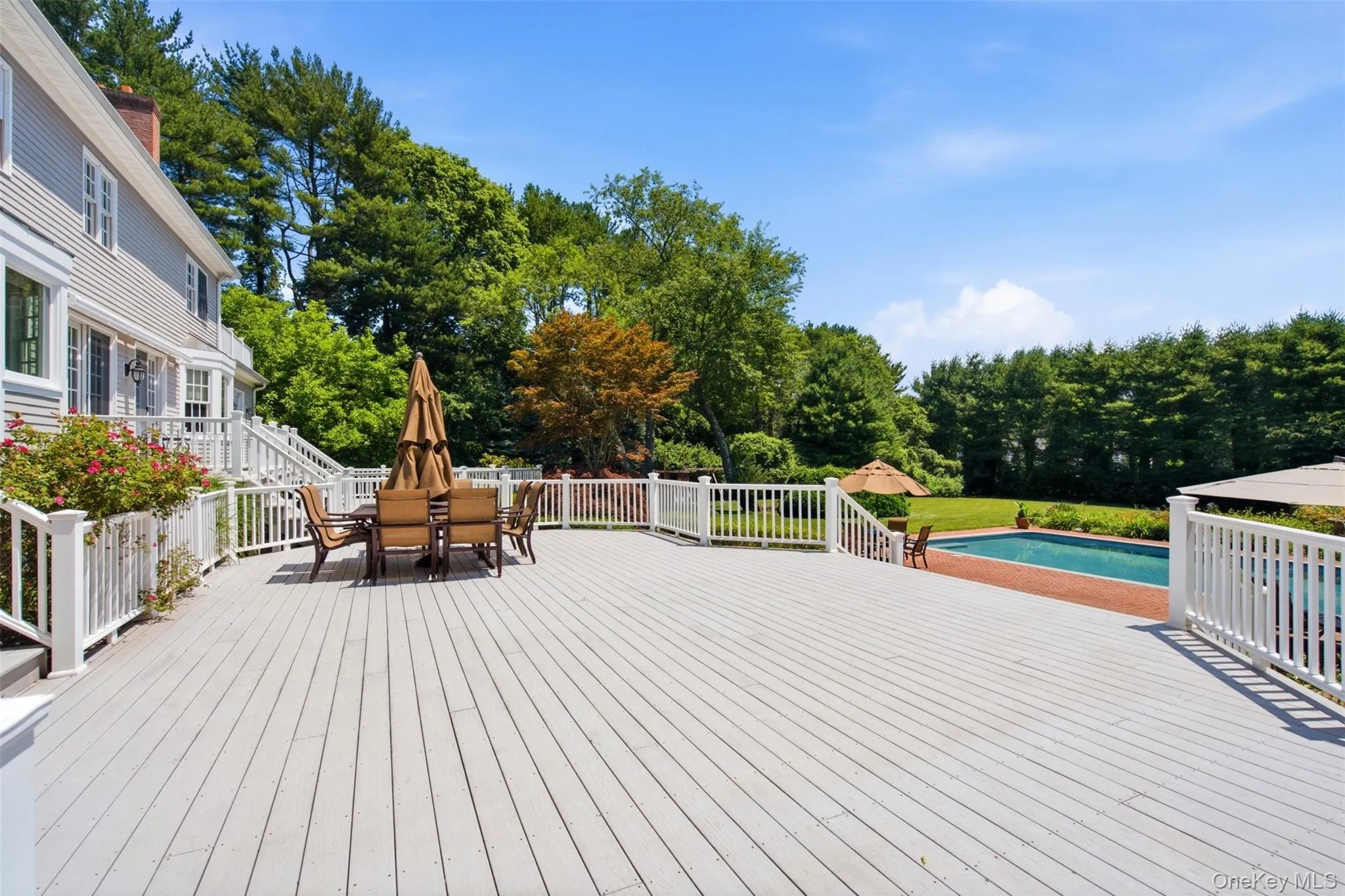 Expansive Trex deck for easy entertainment or quiet enjoyment Expansive Trex deck for easy entertainment or quiet enjoyment