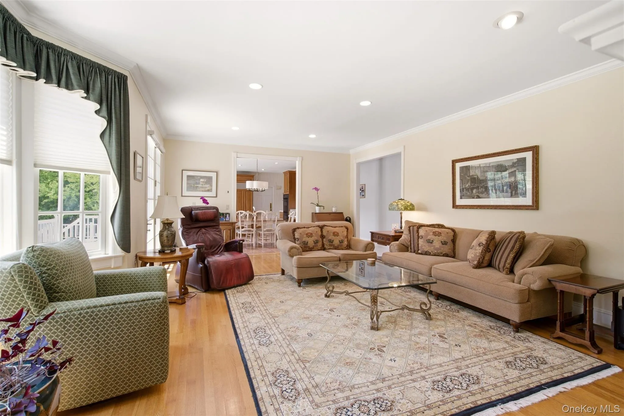 Family room with sunny bay window overlooking the deck. Family room with sunny bay window overlooking the deck.