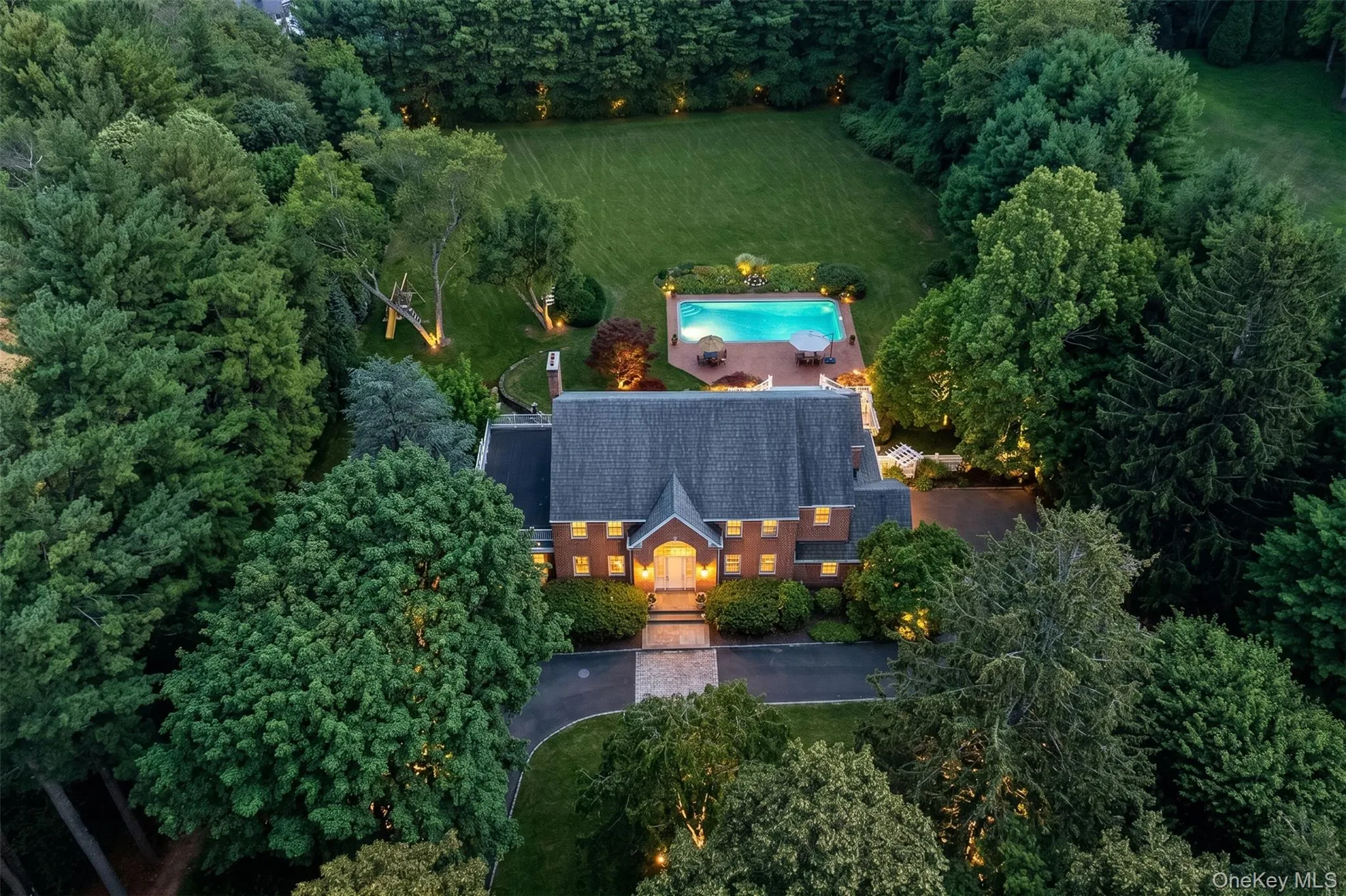 Twilight photo of property Twilight photo of property