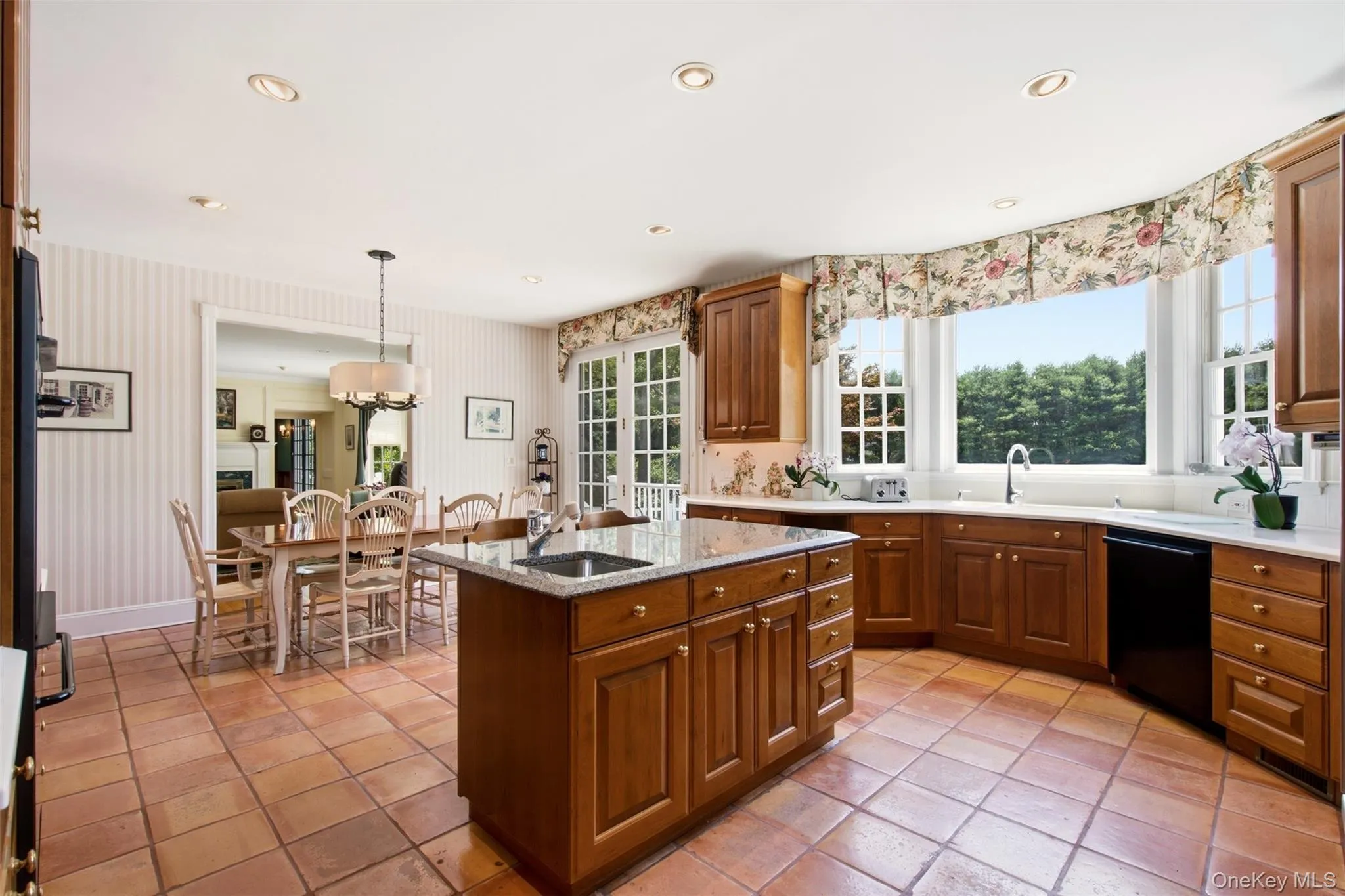 Bay window in the kitchen overlooking the beautiful grounds Bay window in the kitchen overlooking the beautiful grounds