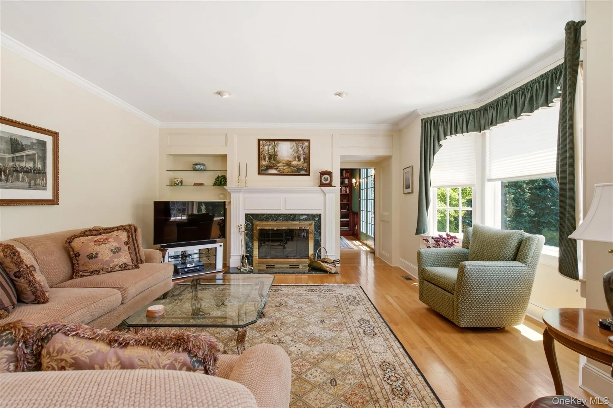 Family room with a wood burning fireplace Family room with a wood burning fireplace