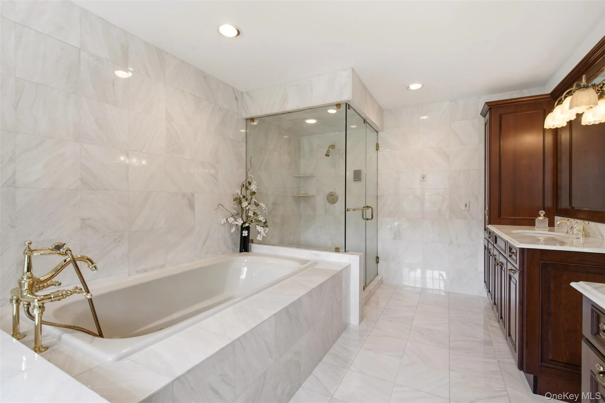 Primary bath with separate jacuzzi tub and steam shower. Primary bath with separate jacuzzi tub and steam shower.