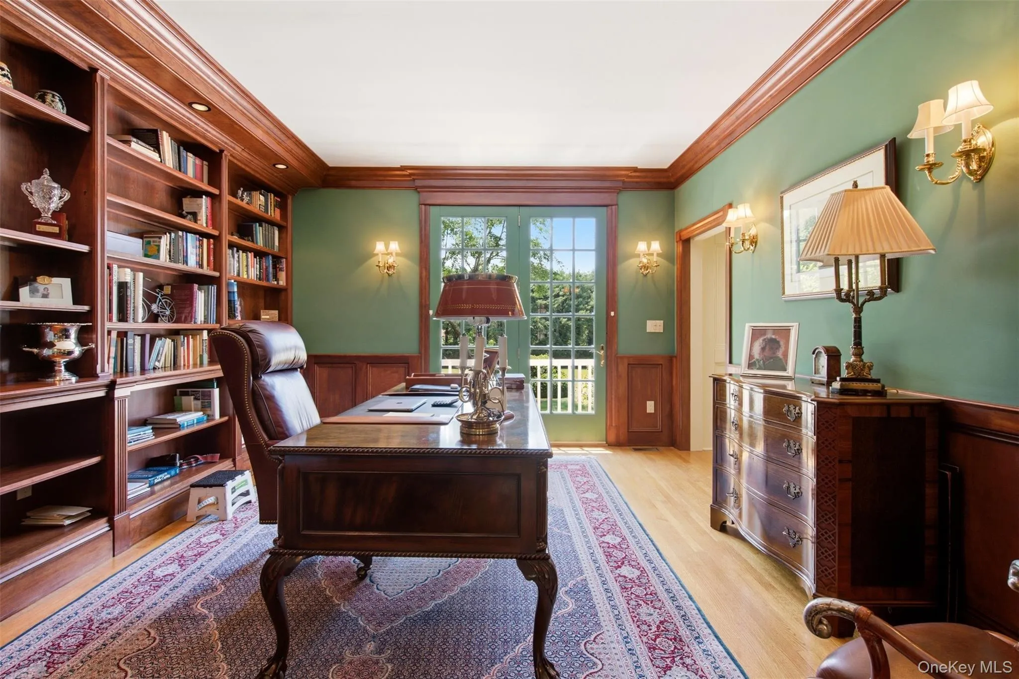 Library has a French door leading to the balcony. Library has a French door leading to the balcony.
