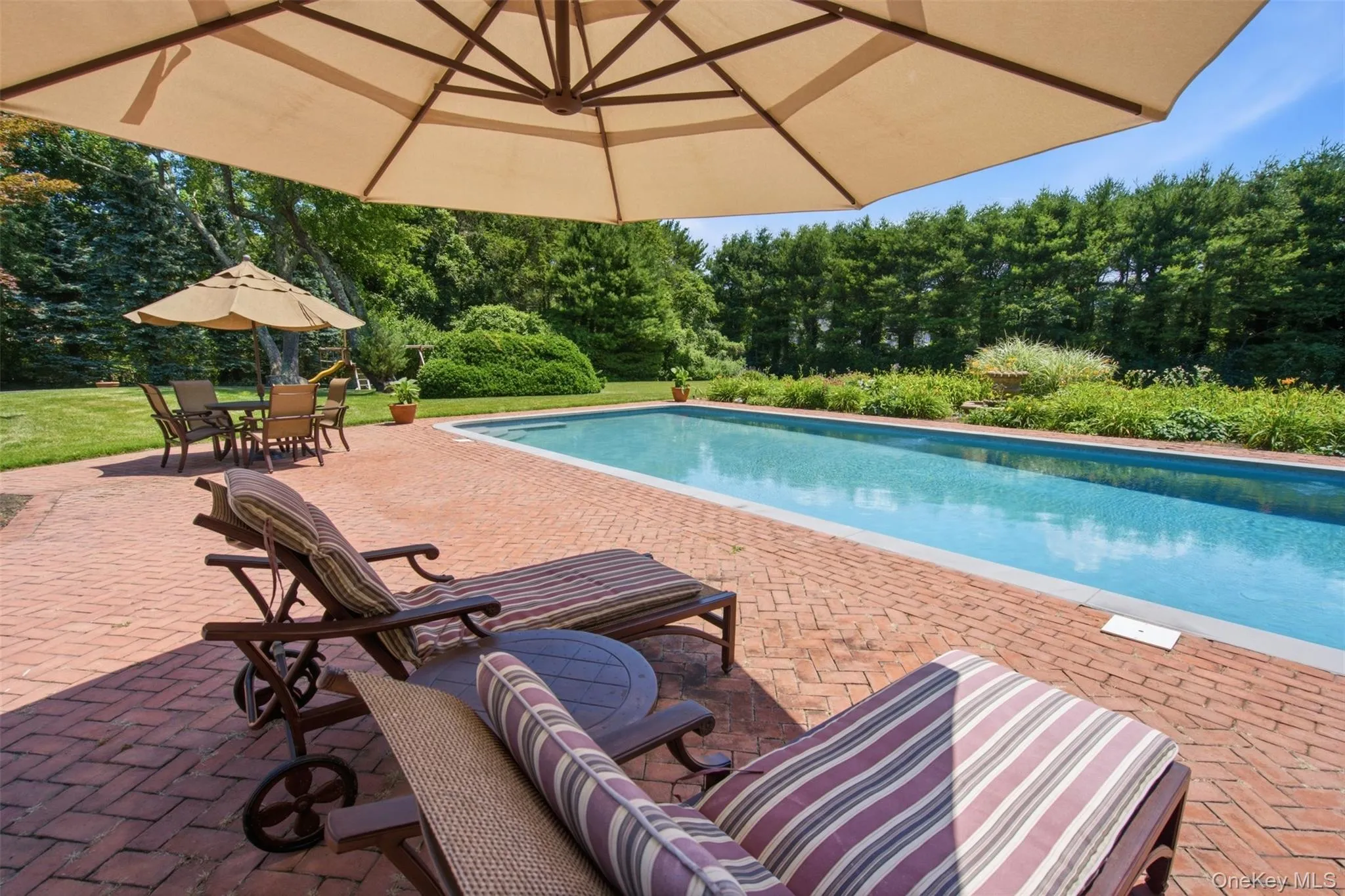 Enjoy sitting under an umbrella enjoying a good book in paradise Enjoy sitting under an umbrella enjoying a good book in paradise