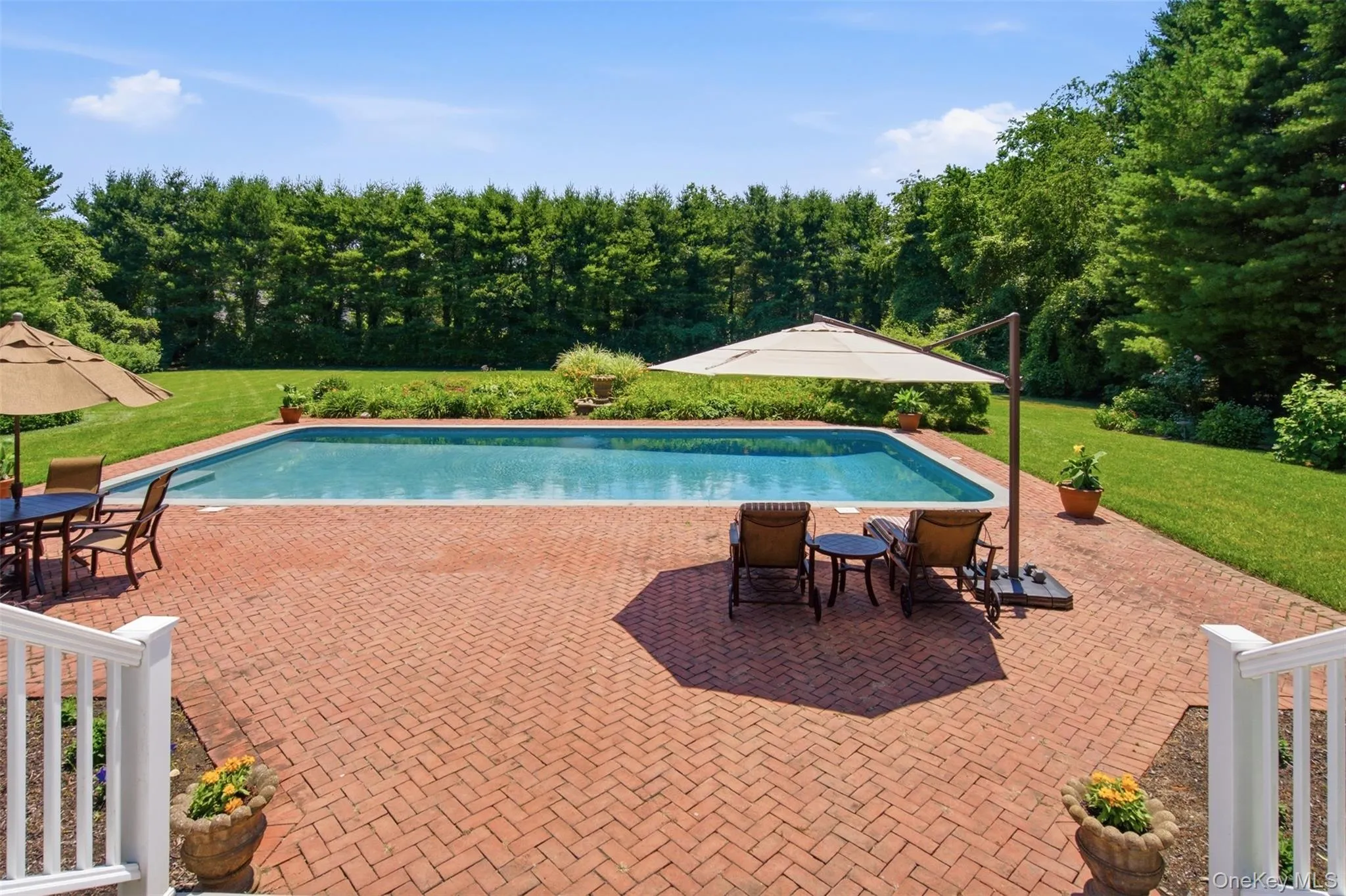Brick terrace surrounding the pool. Brick terrace surrounding the pool.