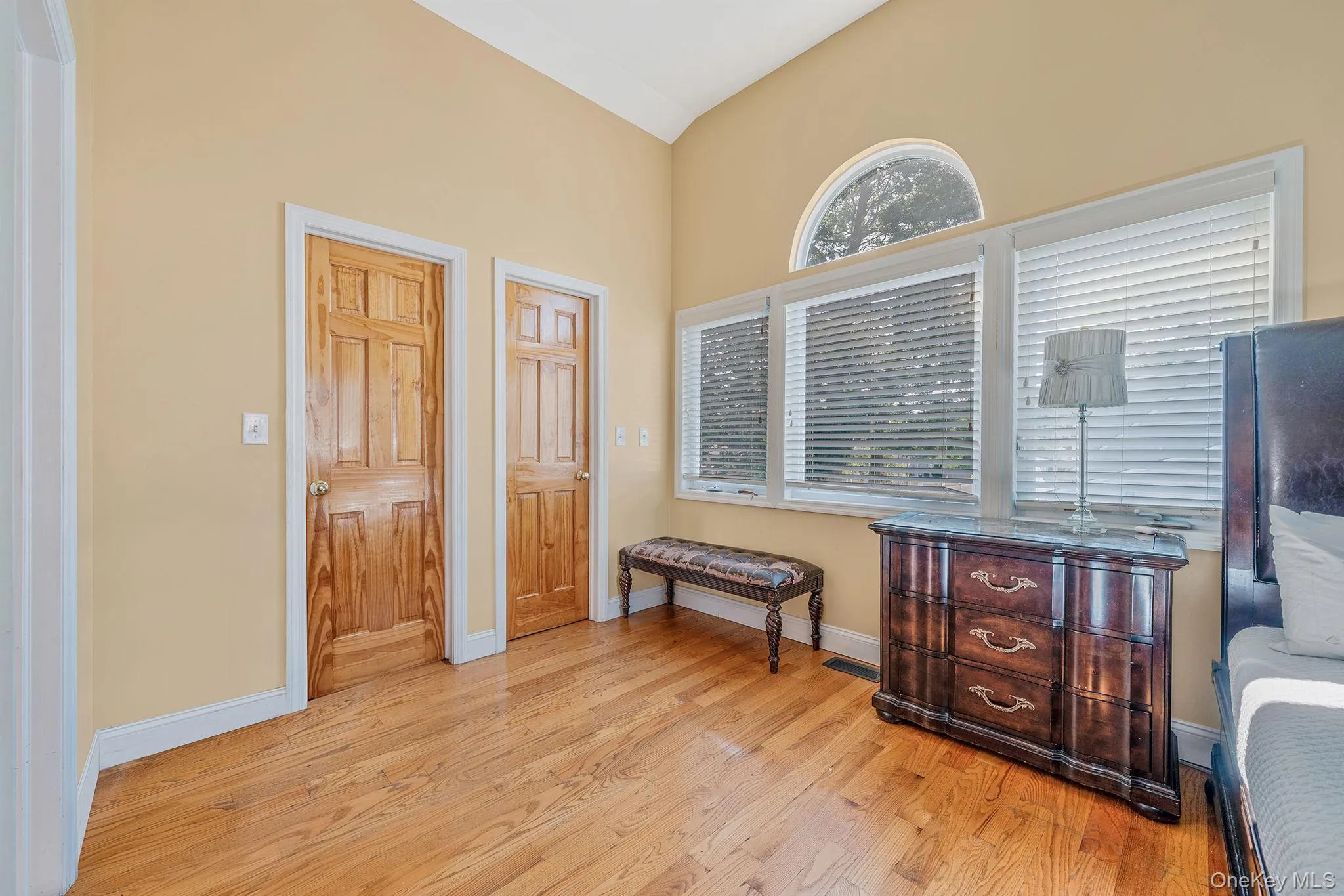 Sitting room featuring light wood finished floors and baseboards Sitting room featuring light wood finished floors and baseboards