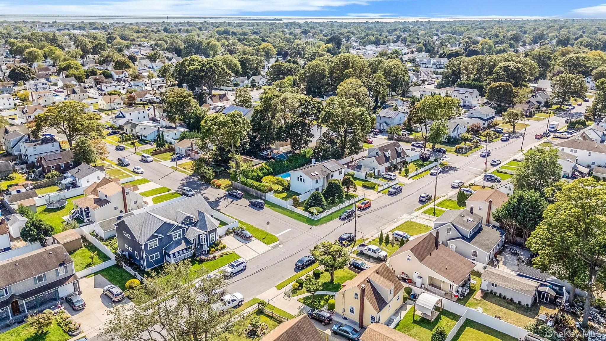 Aerial view of property's location featuring nearby suburban area Aerial view of property's location featuring nearby suburban area