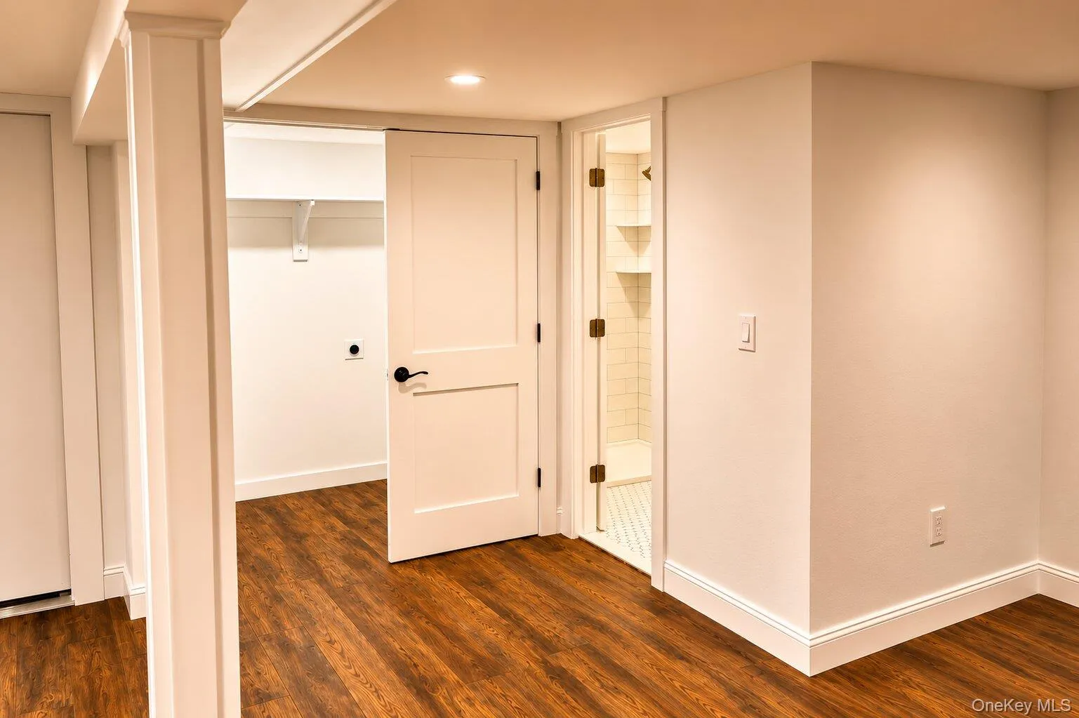 Den with bathroom and laundry room Den with bathroom and laundry room