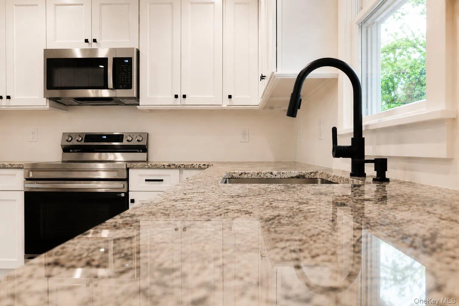 Brand new kitchen featuring new countertops and cabinets Brand new kitchen featuring new countertops and cabinets