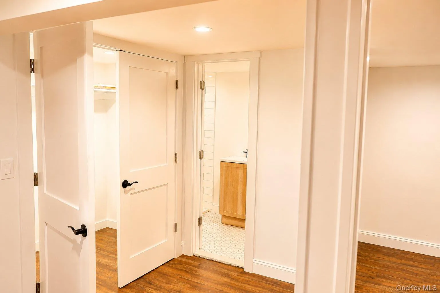 Den with bathroom and laundry room Den with bathroom and laundry room
