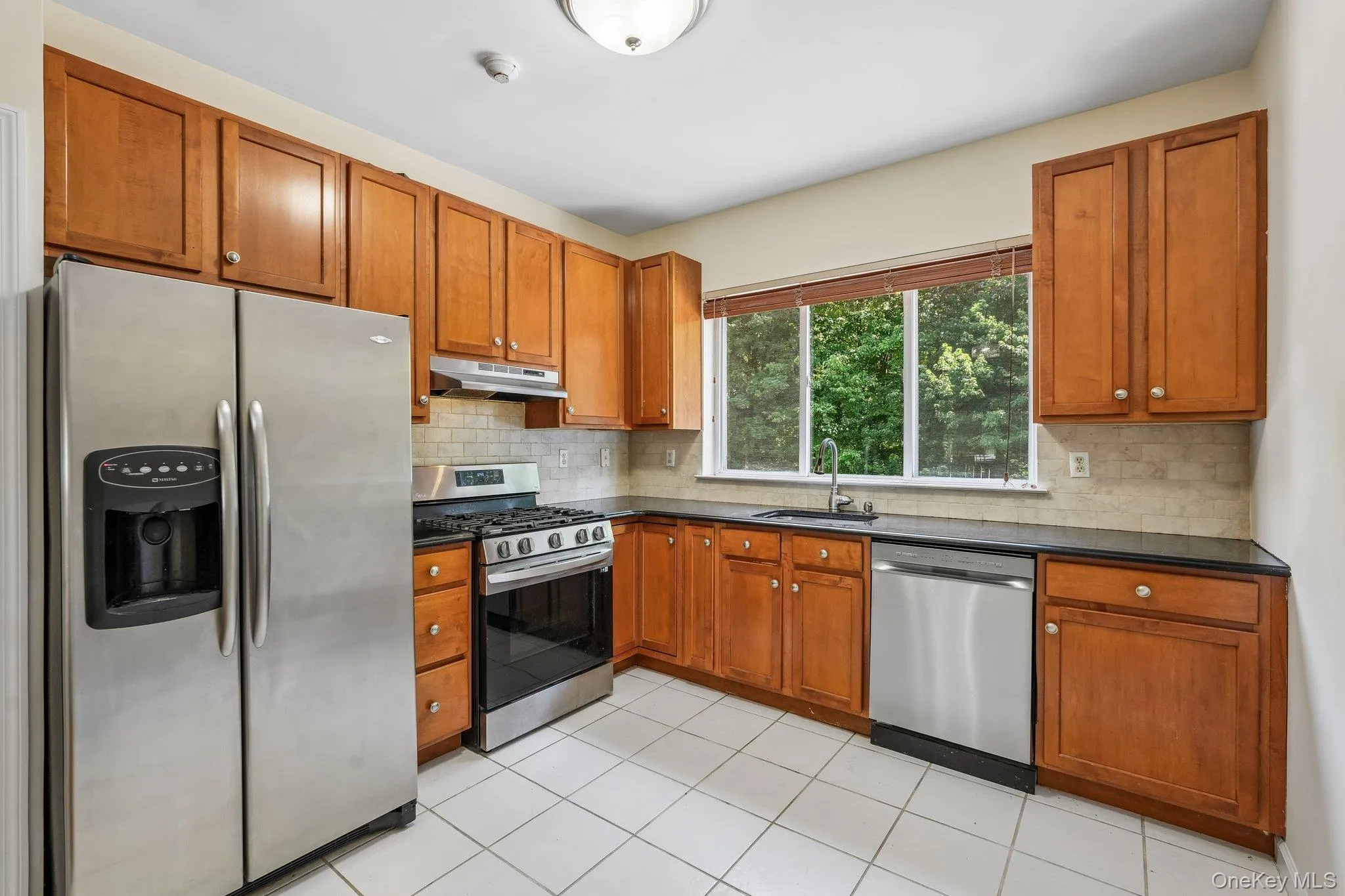 Tall Cherry Cabinetry & Granite Counters Tall Cherry Cabinetry & Granite Counters
