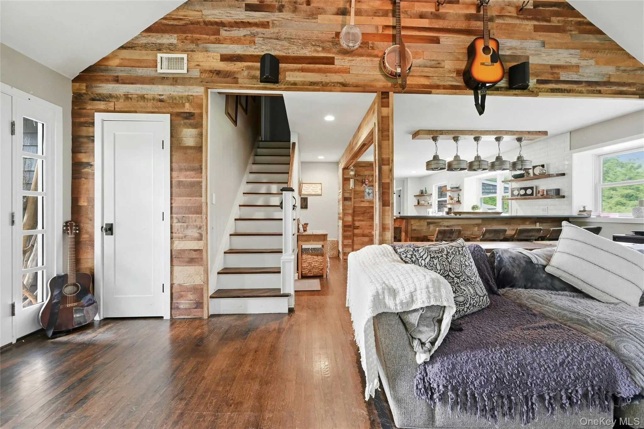 Accent wall featuring varied-tone wood paneling Accent wall featuring varied-tone wood paneling