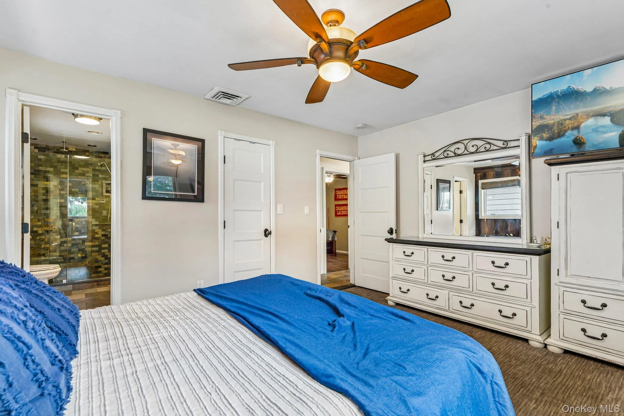 Primary Bedroom with Walk-In Closet & Ensuite Full Bathroom Primary Bedroom with Walk-In Closet & Ensuite Full Bathroom