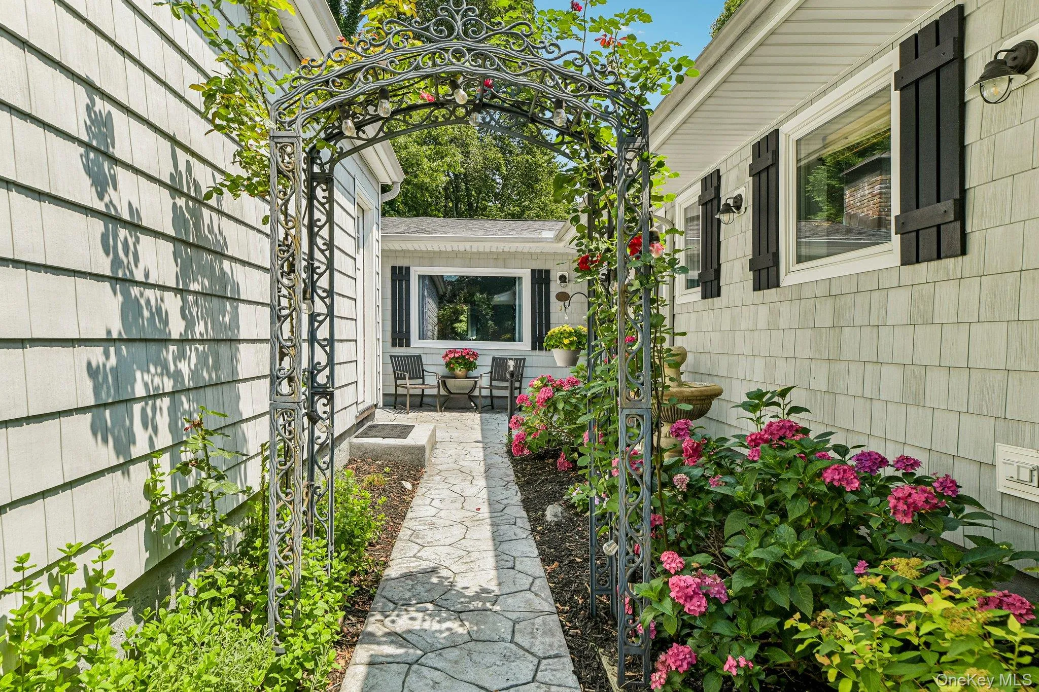 Courtyard Entry heading to Front Door Courtyard Entry heading to Front Door